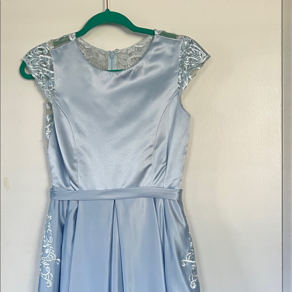 Size 14 light blue dress floor length with pockets and lace back